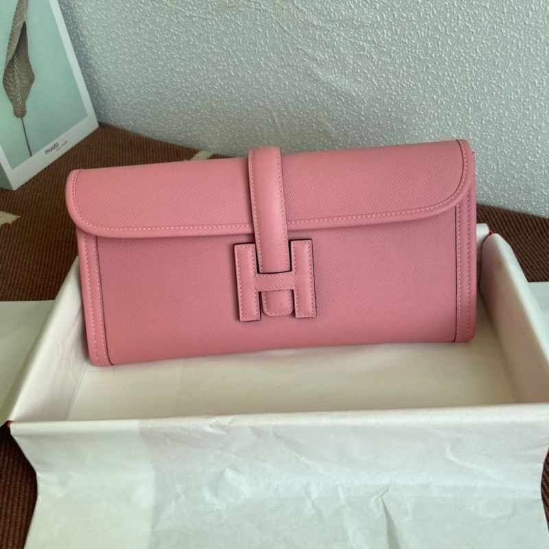 H**mes clutch bags
